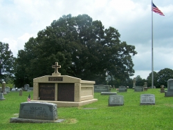 Side-by-side deluxe mausoleum with cross and fluted columns